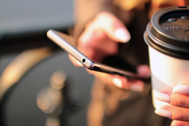 File:Smartphone touchscreen in hand (Pixel.la).jpg